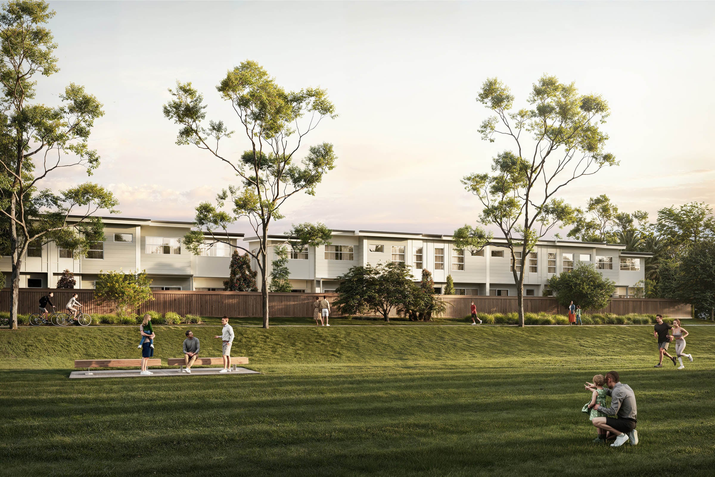 Residents on the parklands beside Parkview Terraces, Burpengary
